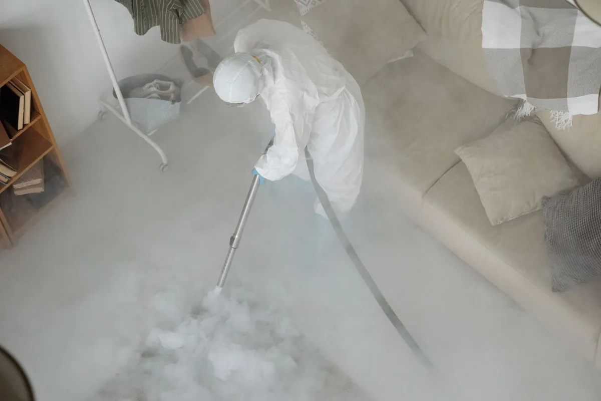 Biohazard cleanup technician in protective equipment, Lenwood, CA